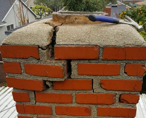 Chimney repair of cracked fireplace