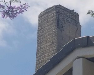 Cracked chimney falling apart